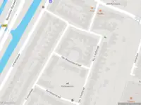 Ambulance met grote spoed naar de Lorentzkade in Haarlem