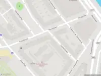 Ambulance met gepaste spoed naar de Couwaelstraat in Rotterdam