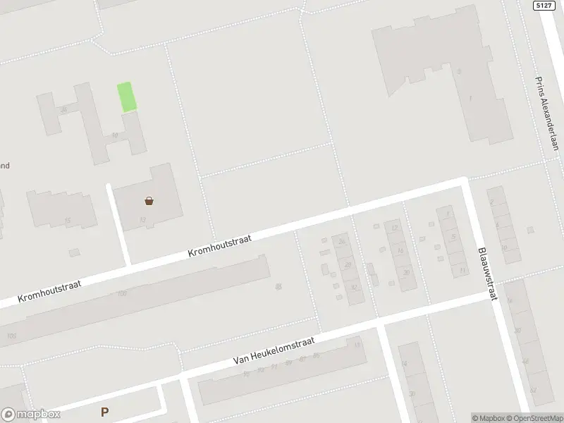 Ambulance met gepaste spoed naar de Kromhoutstraat in Rotterdam