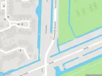 Brandweer met gepaste spoed naar de Schenkeldijk in Dordrecht