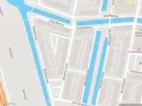 Ambulance met gepaste spoed naar de Westerflierstraat in Rotterdam