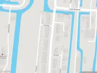 Ambulance met grote spoed naar de Berkenweg in Boskoop