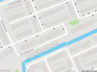 Ambulance met grote spoed naar de Muiderslotstraat in Schiedam