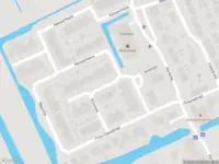 Ambulance met grote spoed naar de Klimroos in Brandwijk