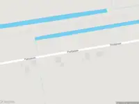 Ambulance en brandweer met grote spoed naar de Poeltjelaan in Zuidbroek vanwege gebouwbrand