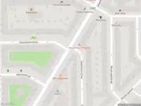 Ambulance met grote spoed naar de Generaal Vetterstraat in Amsterdam