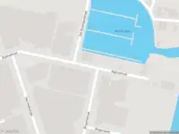 Ambulance met grote spoed naar de Algerastraat in Schiedam