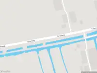 Ambulance met gepaste spoed naar de Torenweg in Giessenburg