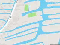 Ambulance met grote spoed naar de De Haal in Oostzaan