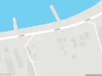 Ambulance met gepaste spoed naar de Lekdijk in Langerak