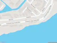 Ambulance met gepaste spoed naar de Schielands Hoge Zeedijk West in Moordrecht