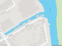 Ambulance met grote spoed naar de Molenwal in Asperen