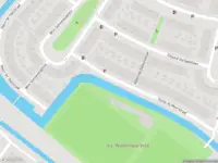 Ambulance met grote spoed naar de Guido de Moorstraat in 's-Gravenhage