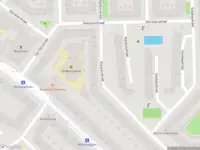 Ambulance met grote spoed naar de Adolf van Nassaustraat in Amsterdam