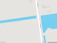 Ambulance met grote spoed naar de Kanaalweg in Warmenhuizen