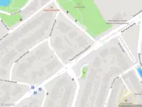 Ambulance met grote spoed naar de Ruys de Beerenbrouckplein in Delft