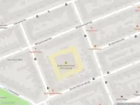 Ambulance met grote spoed naar de Staringstraat in Amsterdam