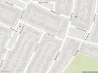 Ambulance met grote spoed naar de Beukenstraat in Haarlem