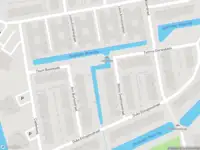 Ambulance met gepaste spoed naar de Obrechtstraat in Leiden