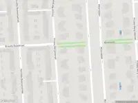 Ambulance met gepaste spoed naar de Cornelis Dopperkade in Amsterdam