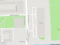 Ambulance met grote spoed naar de Willem Molengraaffstraat in Amsterdam