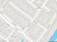 Ambulance met grote spoed naar de Burgemeester G de Katerstraat in Maasdam