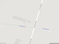 Politie naar de Tienminutenweg in Lunteren vanwege voertuigen te water