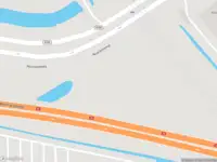 Ambulance met gepaste spoed naar de Noordzeeweg in Amsterdam