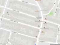 Ambulance met gepaste spoed naar de Van der Vinnestraat in Haarlem