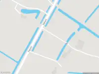 Politie met grote spoed naar de Sopsum in Achlum vanwege voertuigen te water