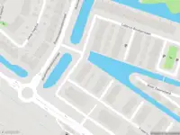 Politie met grote spoed naar de Leeuwenveldseweg in Weesp vanwege voertuigen te water