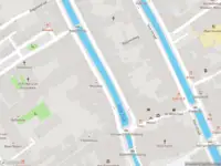 Ambulance met gepaste spoed naar de Voorstraat in Delft