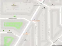 Ambulance met grote spoed naar de Haarlemmermeerstraat in Amsterdam