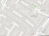 Ambulance met gepaste spoed naar de Van Egmondstraat in Haarlem