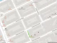 Ambulance met gepaste spoed naar de Alberdingk Thijmstraat in Amsterdam