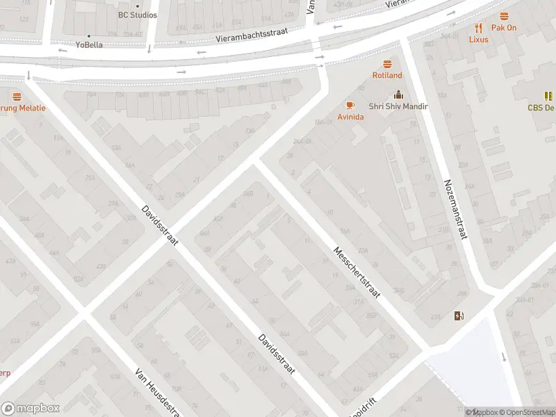 Ambulance met grote spoed naar de Messchertstraat in Rotterdam