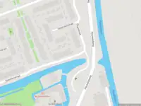 Ambulance met gepaste spoed naar de Ilpendamstraat in Zaandam