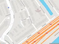 Ambulance met grote spoed naar de Koornwaardstraat in Rotterdam