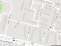 Ambulance met grote spoed naar de Burgemeester Fockstraat in Amsterdam