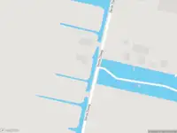 Politie naar de Derde Zijweg in Mijdrecht vanwege personen te water