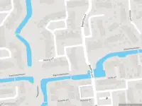 Ambulance met grote spoed naar de Helena erf in Capelle aan den IJssel