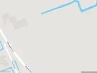 Politie met grote spoed naar de Hikkaarderdyk in Burdaard vanwege voertuigen te water