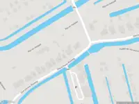 Ambulance met gepaste spoed naar de Overschiese Kleiweg in Rotterdam