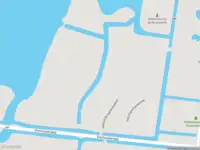 Brandweer met grote spoed naar de Vierhuisterweg in Leeuwarden vanwege personen te water