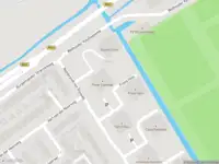 Ambulance met grote spoed naar de Pieter Lastman in Ouderkerk aan de Amstel