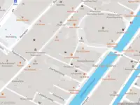 Ambulance met gepaste spoed naar de Sint Annendwarsstraat in Amsterdam