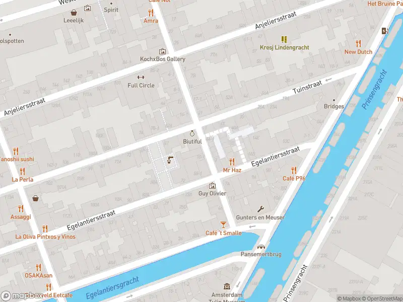 Ambulance met grote spoed naar de Eerste Egelantiersdwarsstraat in Amsterdam