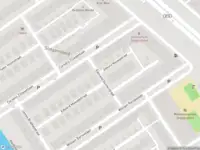 Ambulance met grote spoed naar de Edmund Gunterstraat in Amsterdam