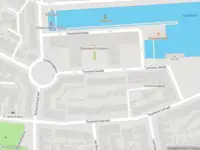 Politie met grote spoed naar de Tamboerskade in Tilburg vanwege personen te water