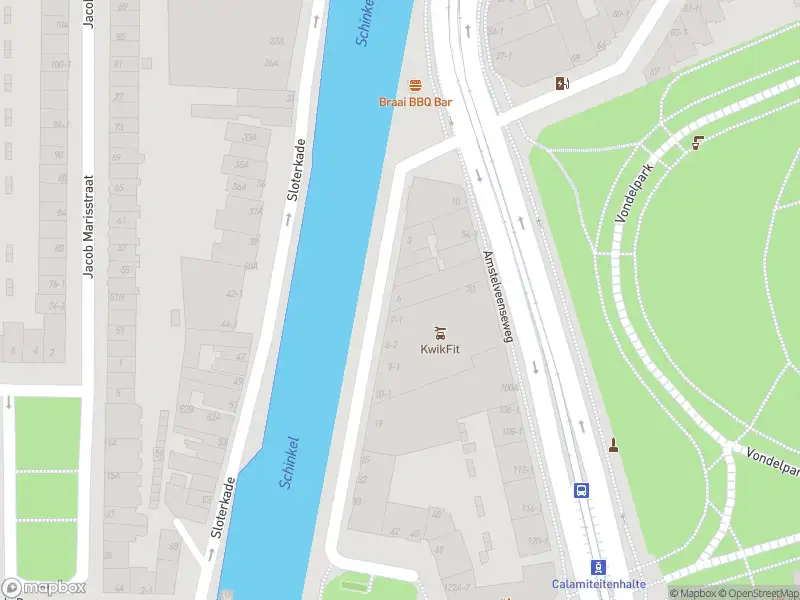 Ambulance met grote spoed naar de Schinkelhavenkade in Amsterdam